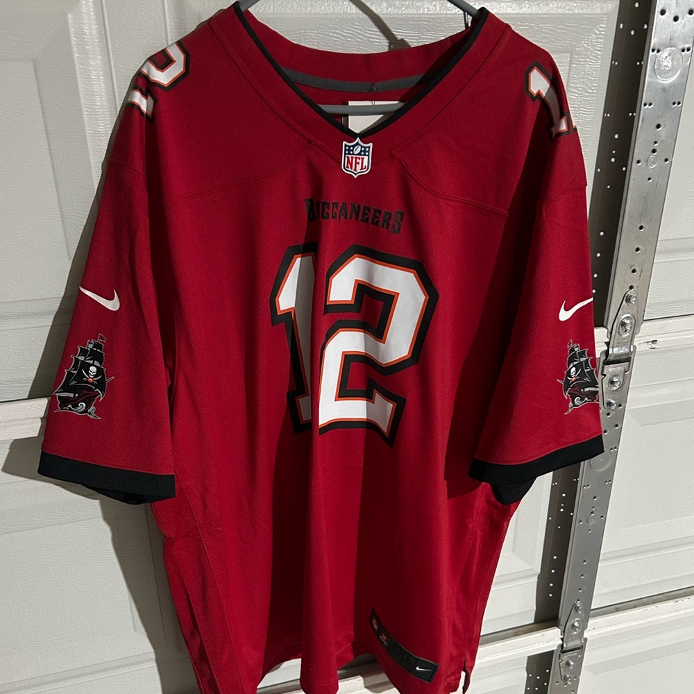 NFL Buccaneers Tom Brady jersey. Size 3XL. Small tear by tag. New without tags.
